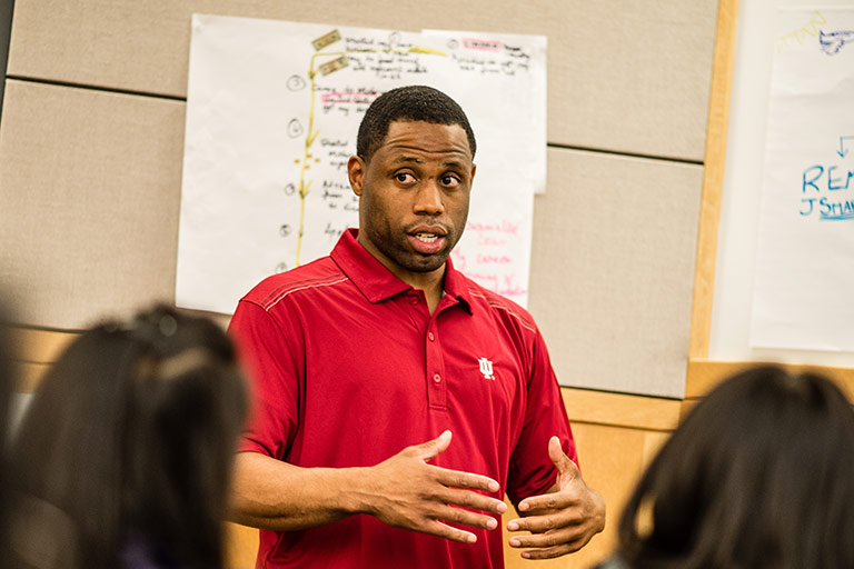 An MBA student presents his Me., Inc. story to classmates